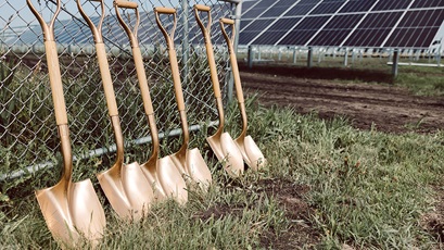 Six gold shovels at a solar array at a biodiesel production facility in Mason City, Iowa.